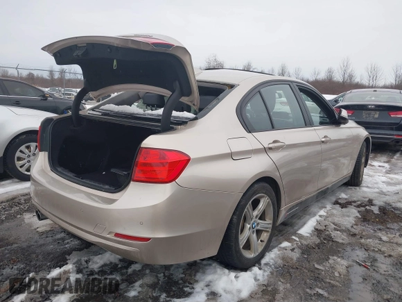 2014 BMW 3 Series 328i xDrive with VIN WBA3B5G52ENS09642, listed as a IAAI auction lot 41703927 with 109,402 mi miles and . Bid and sale history available at DreamBid. Image 4.