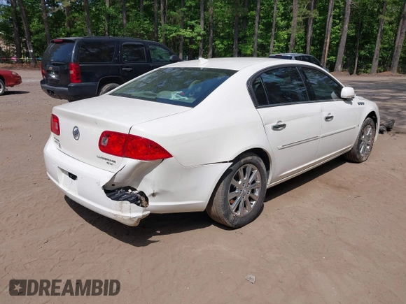 2009 Buick Lucerne CXL with VIN 1G4HD57M79U135698, listed as a IAAI auction lot 42165966 with 131,615 mi miles. Bid and sale history available at carsss.com. Image 4.
