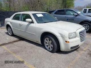 2006 Chrysler 300 with VIN 2C3LA43R16H250237, listed as a IAAI auction lot 42002745 with 157,911 mi miles. Bid and sale history available at carsss.com. Image 1.