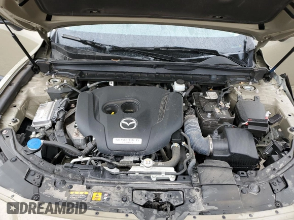 2023 Mazda CX-50 Premium Plus with VIN 7MMVABEY6PN113039, listed as a Copart auction lot 61629645 with 55,759 mi miles and Salvage title. Bid and sale history available at DreamBid. Image 12.