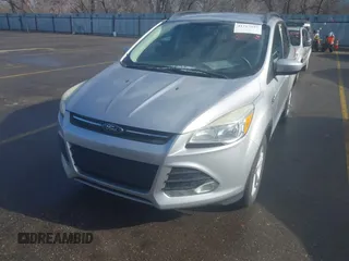 2014 Ford Escape SE with VIN 1FMCU9GX9EUB98758, listed as a IAAI auction lot 41717257 with 126,358 mi miles. Bid and sale history available at carsss.com. Image 6.