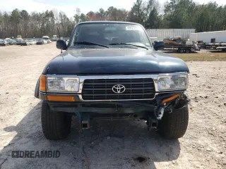 1995 Toyota Land Cruiser z VIN JT3DJ81W9S0112464, wystawiony jako Copart lot #49925395 z przebiegiem 215 698 mil mil oraz Czysty tytuł • Clean title. Historia ofert i sprzedaży dostępna na DreamBid. Obrazek 5.