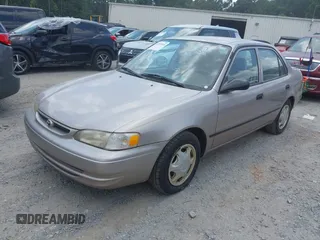 1998 Toyota Corolla VE with VIN 1NXBR12E0WZ051301, listed as a IAAI auction lot 42701905 with Not provided miles and . Bid and sale history available at DreamBid. Image 2.