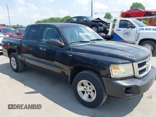 2008 Dodge Dakota SLT with VIN 1D7HW48K78S593988, listed as a IAAI auction lot 42825788 with 216,208 mi miles and . Bid and sale history available at DreamBid. Image 1.