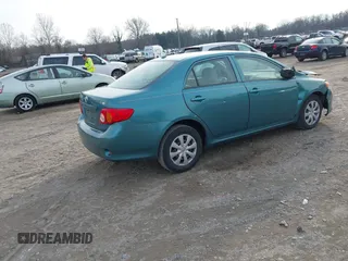 2009 Toyota Corolla with VIN JTDBL40E29J017358, listed as a IAAI auction lot 41041604 with 233,205 mi miles. Bid and sale history available at carsss.com. Image 4.
