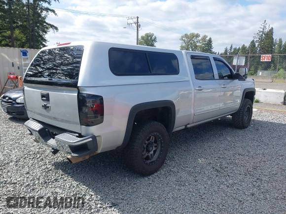 2017 Chevrolet Silverado 1500 LT with VIN 3GCUKREC7HG233366, listed as a IAAI auction lot 42254699 with 105,655 mi miles and . Bid and sale history available at DreamBid. Image 4.