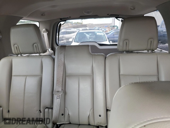 2013 Ford Expedition Limited z VIN 1FMJU1K54DEF55738, wystawiony jako Copart lot #56930915 z przebiegiem 147 658 mil mil oraz Szkoda całkowita • Salvage title. Historia ofert i sprzedaży dostępna na DreamBid. Obrazek 10.