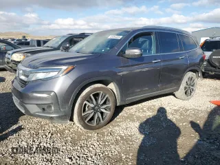 2020 Honda Pilot Touring 7-Passenger z VIN 5FNYF6H63LB009617, wystawiony jako Copart lot #46064455 z przebiegiem 107 144 mil mil oraz Szkoda całkowita • Salvage title. Historia ofert i sprzedaży dostępna na DreamBid. Obrazek 1.