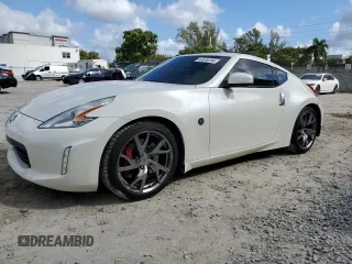 2014 Nissan 370Z Touring with VIN JN1AZ4EH6EM630690, listed as a Copart auction lot 43939795 with 66,797 mi miles and Salvage Title. Bid and sale history available at carsss.com. Image 1.