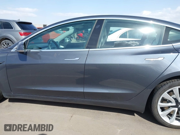 2018 Tesla Model 3 Long Range Battery with VIN 5YJ3E1EA5JF169097, listed as a IAAI auction lot 41916873 with 81,919 mi miles. Bid and sale history available at carsss.com. Image 14.