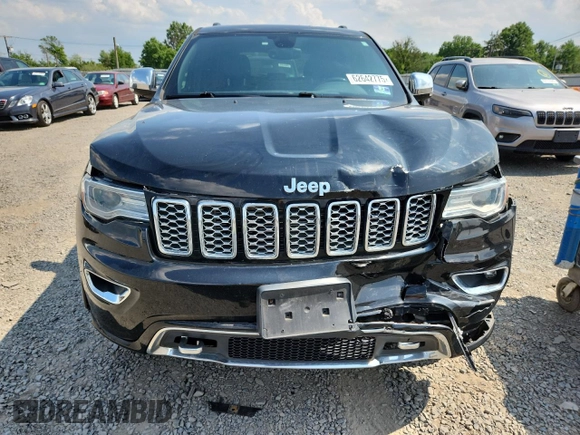 2017 Jeep Grand Cherokee Overland z VIN 1C4RJFCG4HC818132, wystawiony jako Copart lot #62642775 z przebiegiem 116 815 mil mil oraz Szkoda całkowita • Salvage title. Historia ofert i sprzedaży dostępna na DreamBid. Obrazek 5.