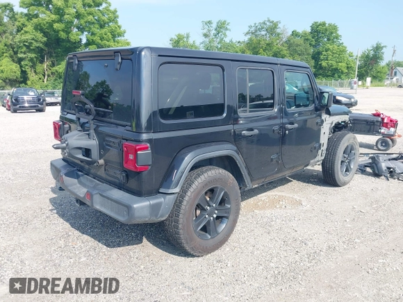 2020 Jeep Wrangler Unlimited Sahara High Altitude with VIN 1C4HJXEGXLW182581, listed as a IAAI auction lot 42612084 with 52,656 mi miles and . Bid and sale history available at DreamBid. Image 4.