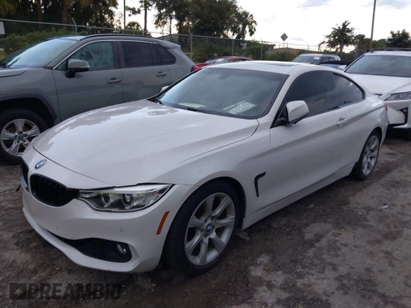 2015 BMW 4 Series 428i with VIN WBA3N3C54FK233803, listed as a IAAI auction lot 40481486 with 74,556 mi miles and . Bid and sale history available at DreamBid. Image 2.
