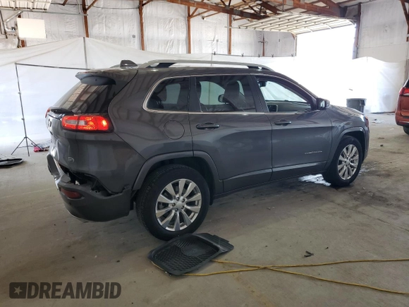 2018 Jeep Cherokee Overland with VIN 1C4PJMJXXJD594749, listed as a Copart auction lot 56049145 with 178,471 mi miles and Salvage title. Bid and sale history available at DreamBid. Image 3.