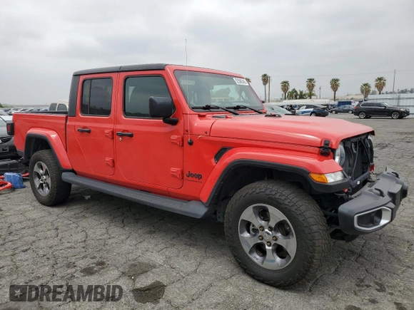 2023 Jeep Gladiator Sport S with VIN 1C6HJTAG4PL547608, listed as a Copart auction lot 52566245 with 8,464 mi miles and Salvage title. Bid and sale history available at DreamBid. Image 4.