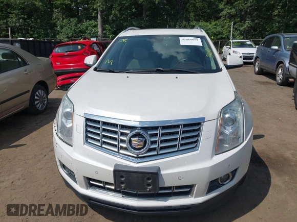 2014 Cadillac SRX Performance Collection with VIN 3GYFNFE34ES677712, listed as a IAAI auction lot 42668059 with 150,135 mi miles and . Bid and sale history available at DreamBid. Image 12.