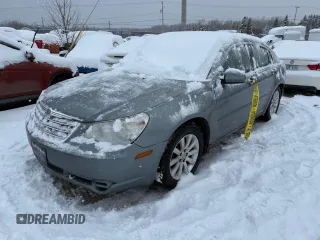 2010 Chrysler Sebring Touring with VIN 1C3CC4FB1AN135341, listed as a Copart auction lot 82492404 with Not Provided miles and Salvage Title. Bid and sale history available at carsss.com. Image 1.