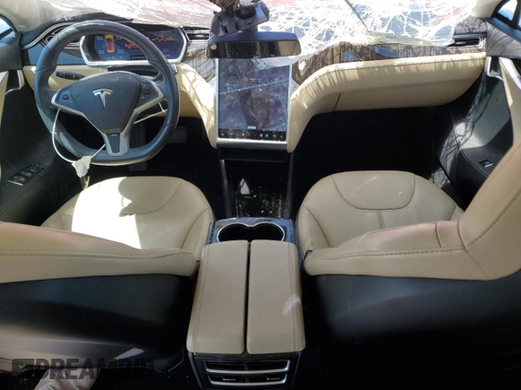 2013 Tesla Model S with VIN 5YJSA1CN1DFP26864, listed as a Copart auction lot 52029485 with 63,260 mi miles and Salvage Title. Bid and sale history available at DreamBid. Image 8.