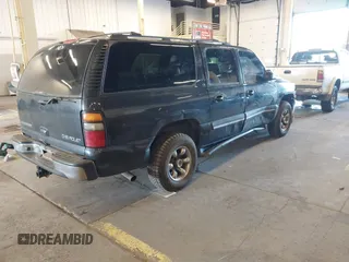 2004 Chevrolet Suburban LT z VIN 1GNFK16Z64J268977, wystawiony jako IAAI lot #41573029 z przebiegiem 181 923 mil mil oraz . Historia ofert i sprzedaży dostępna na DreamBid. Obrazek 4.