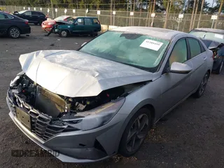 2021 Hyundai Elantra SEL z VIN 5NPLN4AG1MH012443, wystawiony jako IAAI lot #41209499 z przebiegiem 57 829 mil mil oraz . Historia ofert i sprzedaży dostępna na DreamBid. Obrazek 18.
