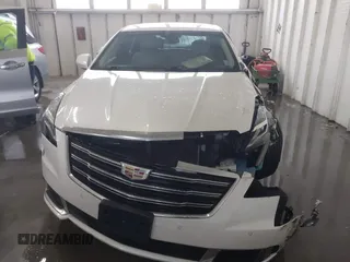 2018 Cadillac XTS Luxury z VIN 2G61M5S38J9156679, wystawiony jako IAAI lot #41574733 z przebiegiem 65 637 mil mil oraz . Historia ofert i sprzedaży dostępna na DreamBid. Obrazek 12.