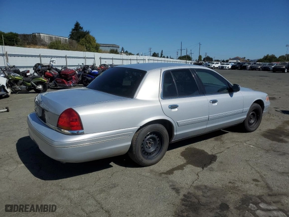 2000 Ford Crown Victoria Police Pkg Police Interceptor with VIN 2FAFP71W4YX119755, listed as a Copart auction lot 68950904 with NaN miles and Salvage Title. Bid and sale history available at carsss.com. Image 3.