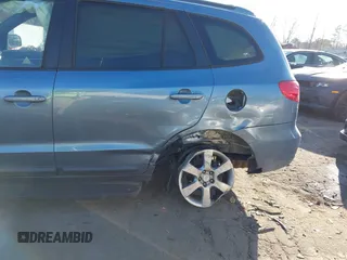 2009 Hyundai Santa Fe Limited with VIN 5NMSH13E49H308879, listed as a IAAI auction lot 41496700 with 183,499 mi miles and . Bid and sale history available at DreamBid. Image 6.