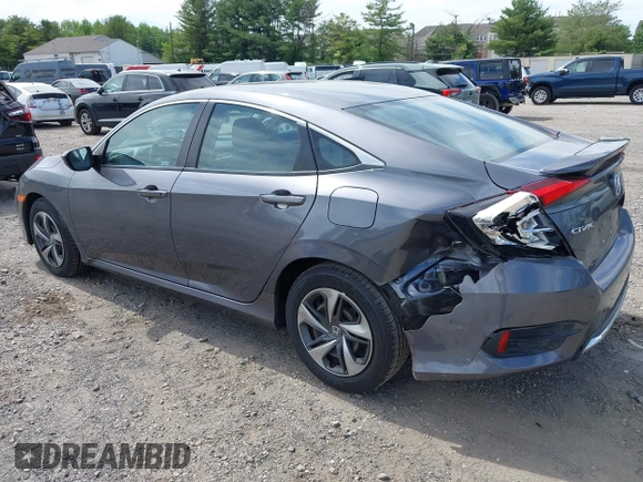 2021 Honda Civic LX with VIN 2HGFC2F65MH525423, listed as a IAAI auction lot 42319862 with 37,248 mi miles and . Bid and sale history available at DreamBid. Image 3.