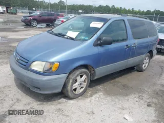 2002 Toyota Sienna LE with VIN 4T3ZF13C52U504124, listed as a IAAI auction lot 42223098 with 188,413 mi miles and . Bid and sale history available at DreamBid. Image 2.