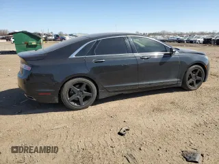 2015 Lincoln MKZ z VIN 3LN6L2GK1FR613074, wystawiony jako Copart lot #52157775 z przebiegiem 118 144 mil mil oraz Szkoda całkowita • Salvage title. Historia ofert i sprzedaży dostępna na DreamBid. Obrazek 3.