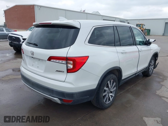 2021 Honda Pilot EX-L with VIN 5FNYF6H55MB031305, listed as a IAAI auction lot 41476636 with 58,754 mi miles. Bid and sale history available at carsss.com. Image 4.