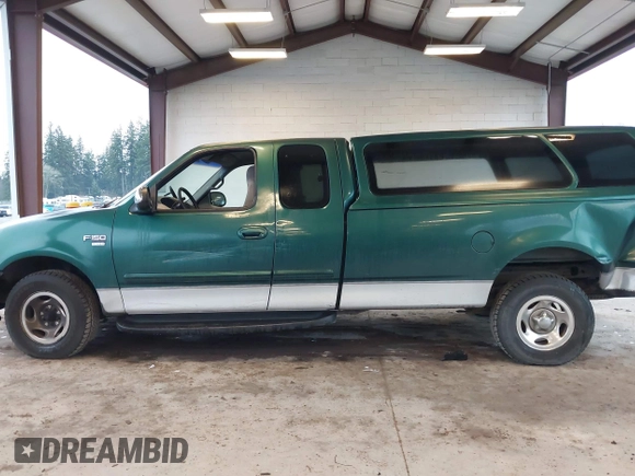 1999 Ford F-150 with VIN 2FTRX17L9XCA19030, listed as a IAAI auction lot 41232157 with Not provided miles and . Bid and sale history available at DreamBid. Image 15.
