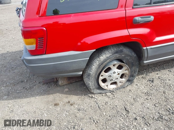 2001 Jeep Grand Cherokee Laredo with VIN 1J4GX48SX1C522670, listed as a IAAI auction lot 42111708 with Not provided miles and . Bid and sale history available at DreamBid. Image 6.