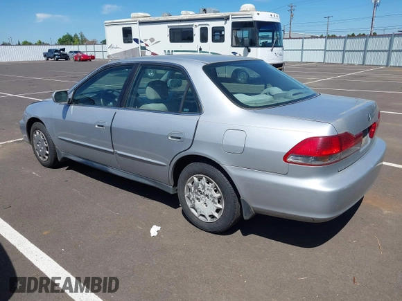 2002 Honda Accord LX with VIN 1HGCG56422A167829, listed as a IAAI auction lot 42401497 with 221,550 mi miles and . Bid and sale history available at DreamBid. Image 3.