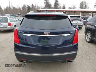 2017 Cadillac XT5 FWD with VIN 1GYKNARS2HZ188557, listed as a IAAI auction lot 41840764 with 104,524 mi miles. Bid and sale history available at carsss.com. Image 16.