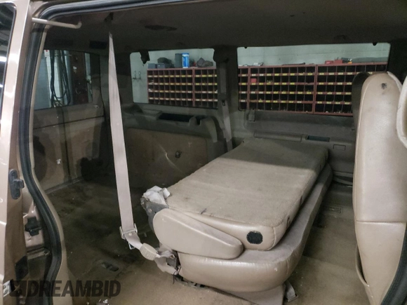 2003 Chevrolet Astro z VIN 1GNEL19X93B144732, wystawiony jako Copart lot #88990585 z przebiegiem 282 328 mil mil oraz Szkoda całkowita • Salvage title. Historia ofert i sprzedaży dostępna na DreamBid. Obrazek 11.