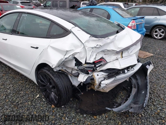 2023 Tesla Model 3 Performance z VIN 5YJ3E1EC9PF545648, wystawiony jako IAAI lot #41573583 z przebiegiem 15 207 mil mil oraz . Historia ofert i sprzedaży dostępna na DreamBid. Obrazek 6.