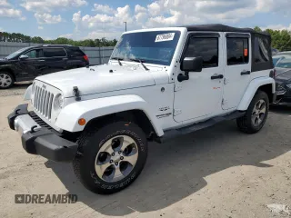 2018 Jeep Wrangler JK Unlimited Sahara with VIN 1C4HJWEG2JL922021, listed as a Copart auction lot 67796004 with 82,056 mi miles and Salvage Title. Bid and sale history available at carsss.com. Image 1.