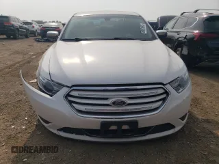 2016 Ford Taurus Limited with VIN 1FAHP2F8XGG124551, listed as a Copart auction lot 60621695 with 103,668 mi miles and Salvage title. Bid and sale history available at DreamBid. Image 5.