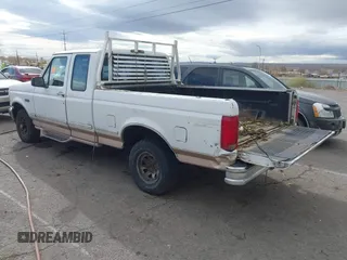 1996 Ford F-150 with VIN 1FTEX14N9TKA35772, listed as a IAAI auction lot 40963486 with 1 mi miles. Bid and sale history available at carsss.com. Image 3.
