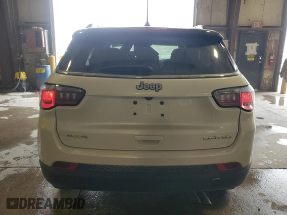 2018 Jeep Compass Limited with VIN 3C4NJDCB5JT373014, listed as a Copart auction lot 57285935 with 85,195 mi miles and Salvage title. Bid and sale history available at DreamBid. Image 6.