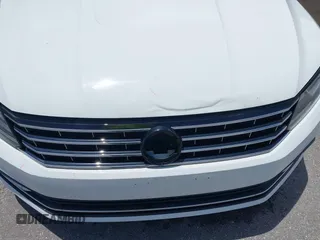 2016 Volkswagen Passat S z VIN 1VWAT7A33GC056162, wystawiony jako IAAI lot #42476725 z przebiegiem 88 872 mil mil oraz . Historia ofert i sprzedaży dostępna na DreamBid. Obrazek 18.