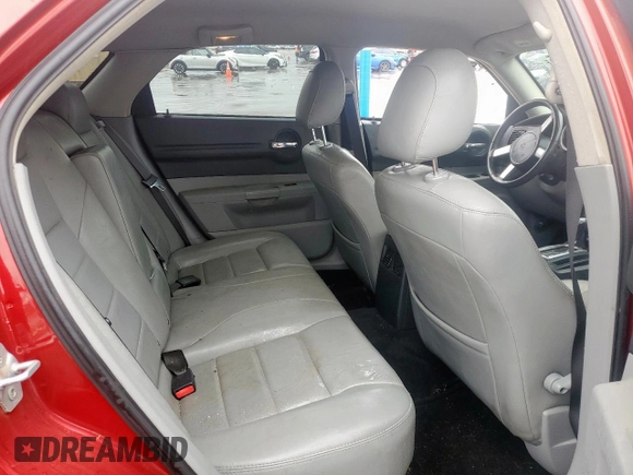 2007 Dodge Magnum SXT with VIN 2D8GZ47V47H771646, listed as a Copart auction lot 52030975 with 150,498 mi miles and Salvage Title. Bid and sale history available at DreamBid. Image 10.
