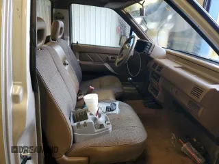 1992 Isuzu Pickup S z VIN 4S1CL11L0N4208813, wystawiony jako Copart lot #80966344 z przebiegiem 166 056 mil mil oraz Szkody całkowita. Historia ofert i sprzedaży dostępna na DreamBid. Obrazek 10.