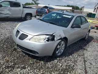 2005 Pontiac G6 GT with VIN 1G2ZH548354152968, listed as a Copart auction lot 62124835 with 126,262 mi miles and Salvage title. Bid and sale history available at DreamBid. Image 1.