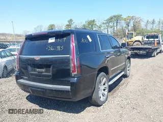 2015 Chevrolet Tahoe LT with VIN 1GNSKBKC5FR229193, listed as a IAAI auction lot 42079931 with Not provided miles and . Bid and sale history available at DreamBid. Image 4.