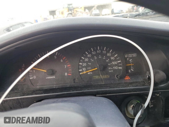 1999 Toyota Tacoma PreRunner z VIN 4TASM92N5XZ417982, wystawiony jako Copart lot #85216054 z przebiegiem 200 772 mil mil oraz Szkoda całkowita • Salvage title. Historia ofert i sprzedaży dostępna na DreamBid. Obrazek 9.