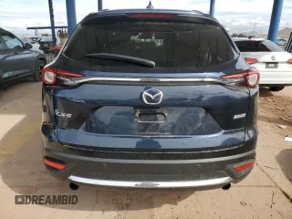 2018 Mazda CX-9 Grand Touring z VIN JM3TCADY2J0220873, wystawiony jako Copart lot #49264875 z przebiegiem Nie podano mil oraz Szkoda całkowita • Salvage title. Historia ofert i sprzedaży dostępna na DreamBid. Obrazek 6.