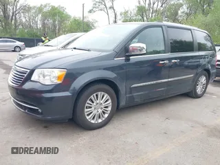 2014 Chrysler Town & Country Limited with VIN 2C4RC1GG3ER188114, listed as a IAAI auction lot 42082618 with 193,562 mi miles and . Bid and sale history available at DreamBid. Image 2.
