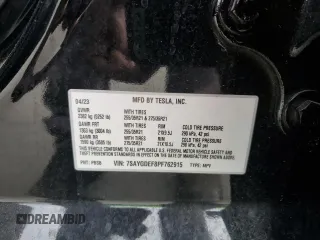 2023 Tesla Model Y Performance with VIN 7SAYGDEF8PF762915, listed as a Copart auction lot 50270285 with 23,893 mi miles and Salvage Title. Bid and sale history available at DreamBid. Image 13.